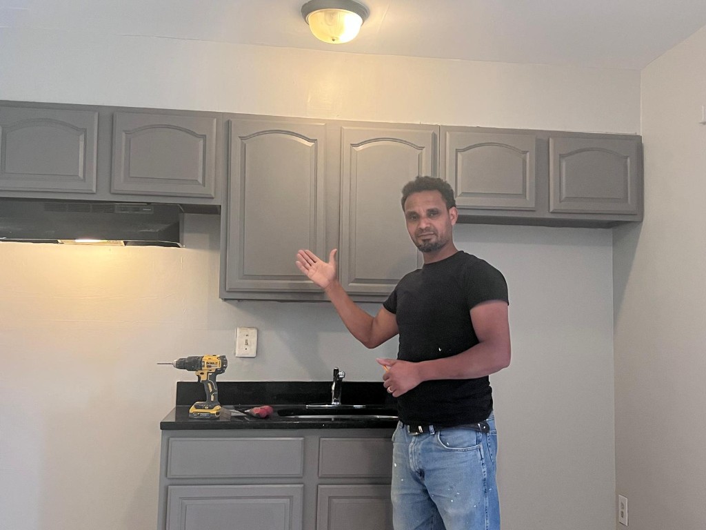 Kitchen remodel — showcasing grey cabinetry and finishing details